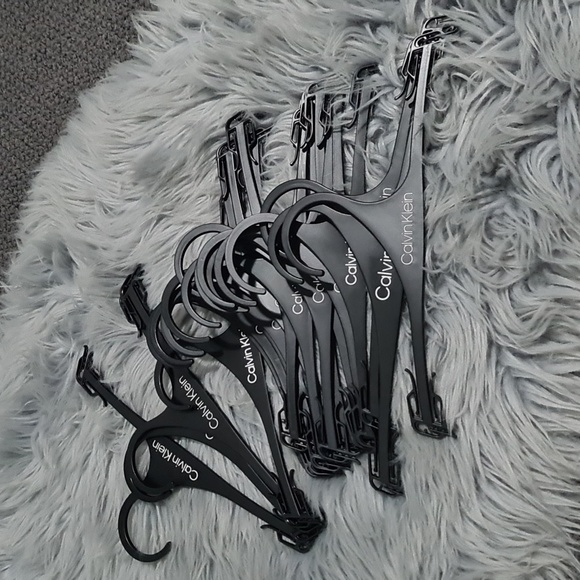 Calvin Klein Dresses & Skirts - Set of 20 calving klein small coat hangers